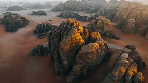 Spektakuläre Felsformationen in der Wüste bei Sonnenaufgang.