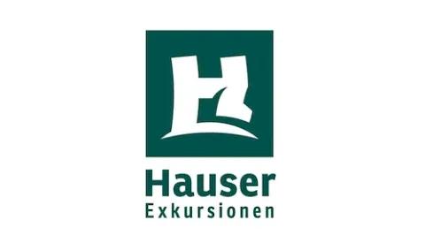 Das grüne Logo von Hauser Exkursionen ist zu sehen.